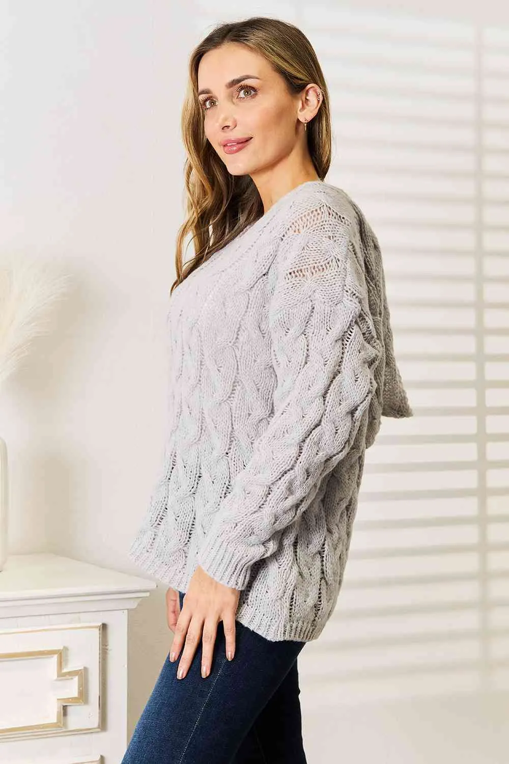 Cozy Up in Cable-Knit Hooded Sweater